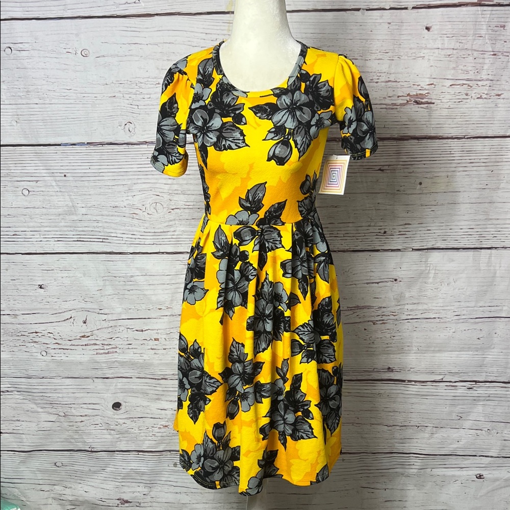 Lula roe Floral Yellow and Gray size extra small midi flowy dress.
